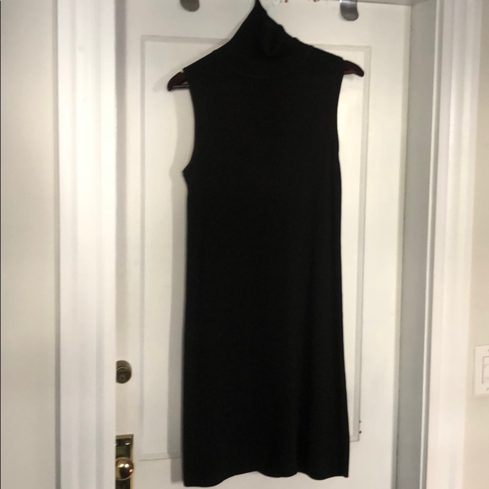 Sleeveless cotton turtleneck sweater dress.